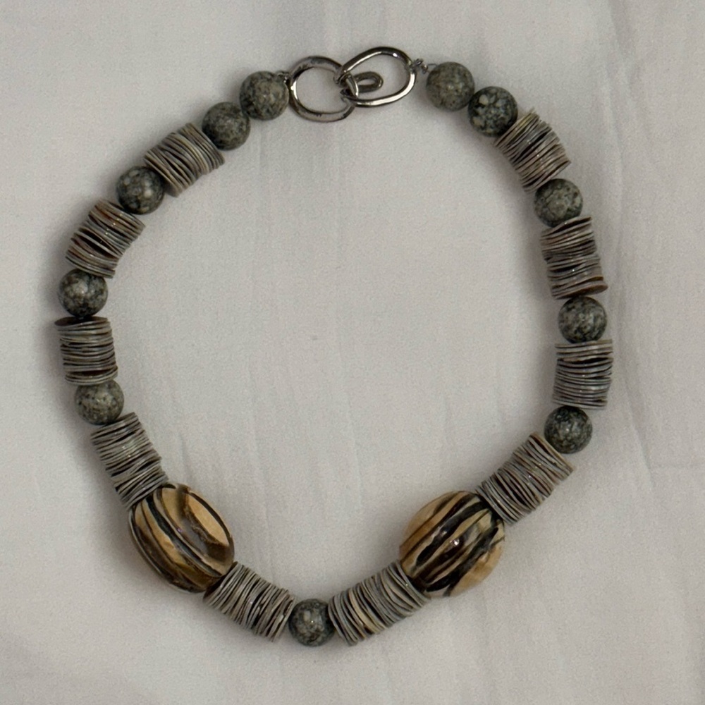 Necklace. Carved beads and shells.